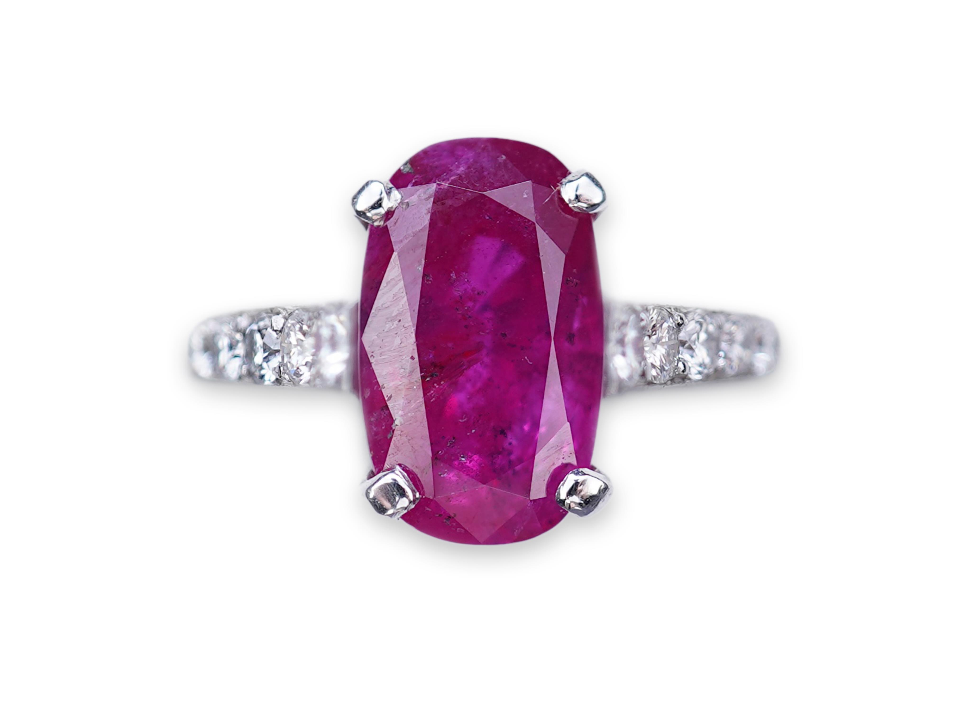 An attractive unheated ruby and diamond ring